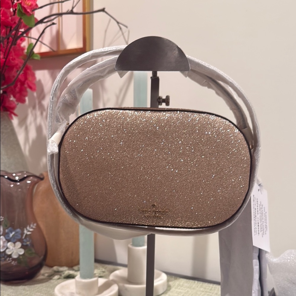 Kate Spade Gold glimmer oval camera Crossbody bag